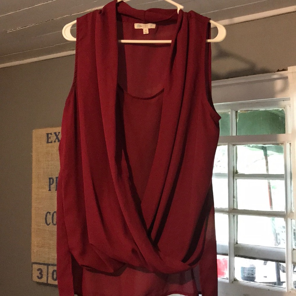 Short sleeve burgundy dress shirt.